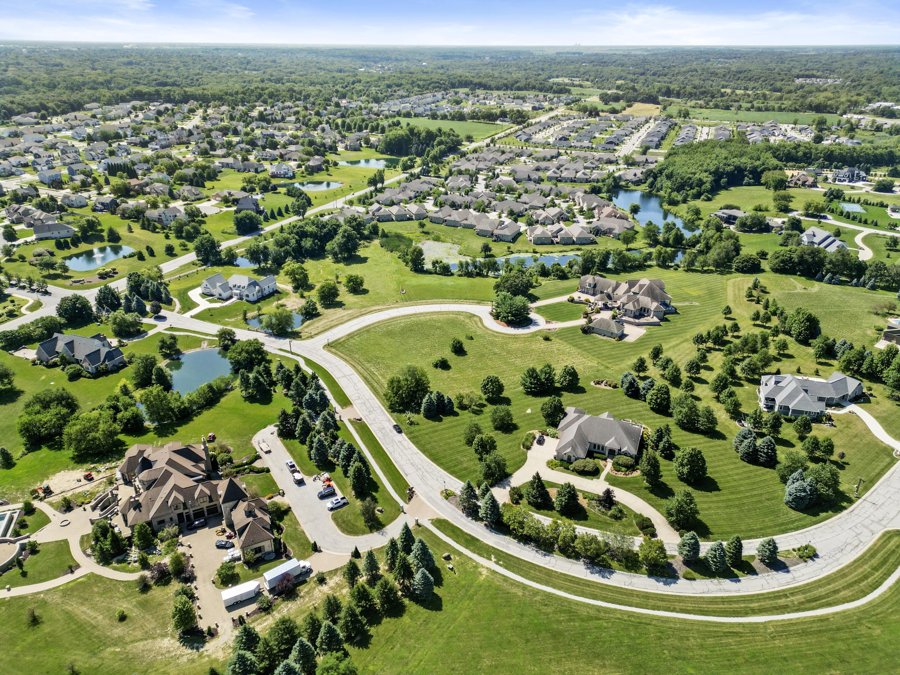 2960 Spring Rain Court Valparaiso, IN 46385 - Photo 9 of 14 an aerial view of residential houses with outdoor space and trees