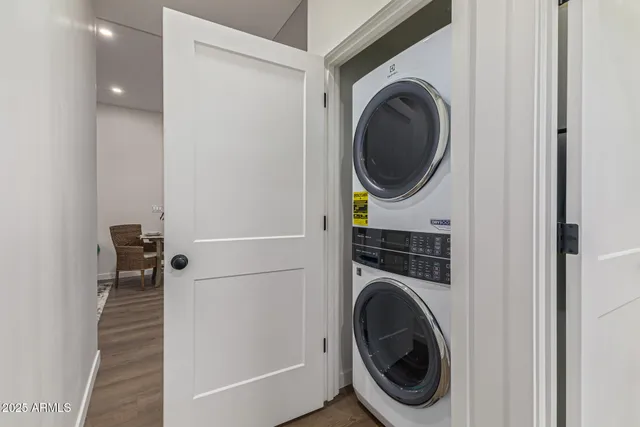 a close view of a utility room with dryer and washer