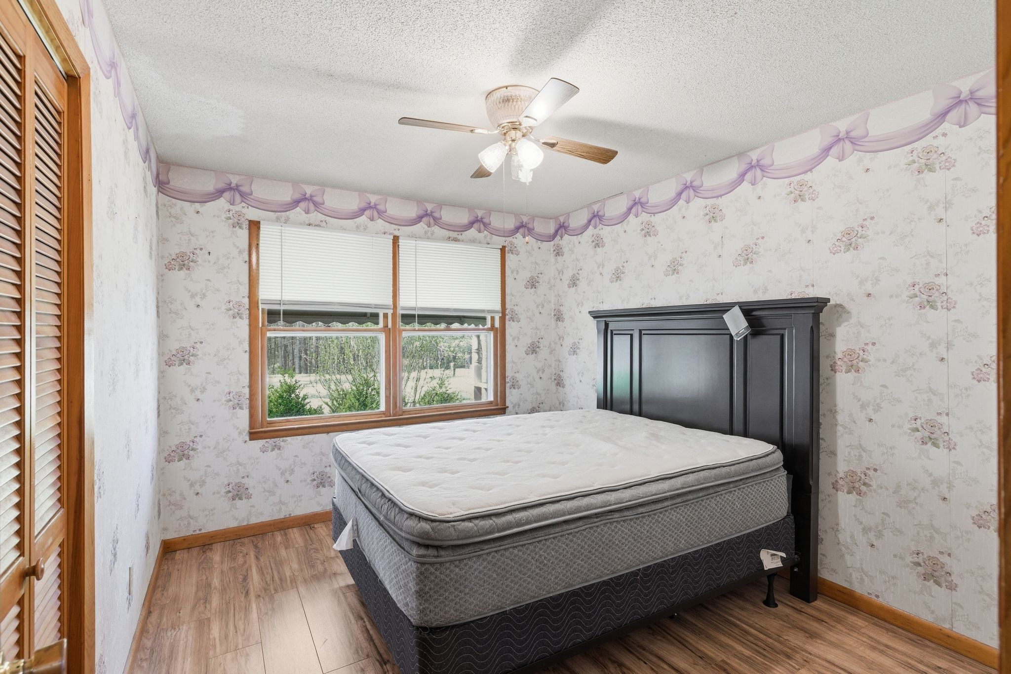 1956 Old Estill Springs Road Winchester, TN 37398 - Photo 13 of 30 a bedroom with a bed and a window