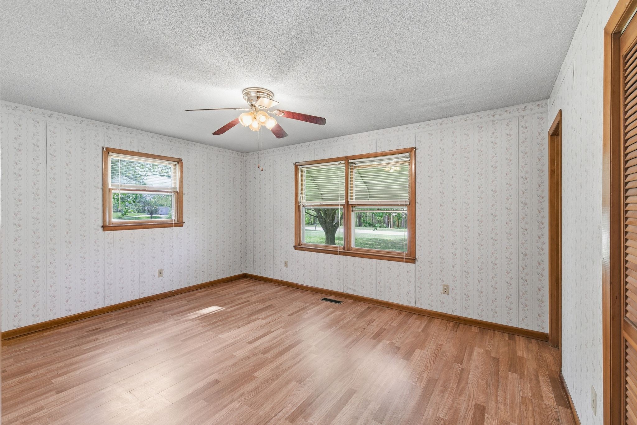 1956 Old Estill Springs Road Winchester, TN 37398 - Photo 15 of 30 a view of an empty room with a window and wooden floor