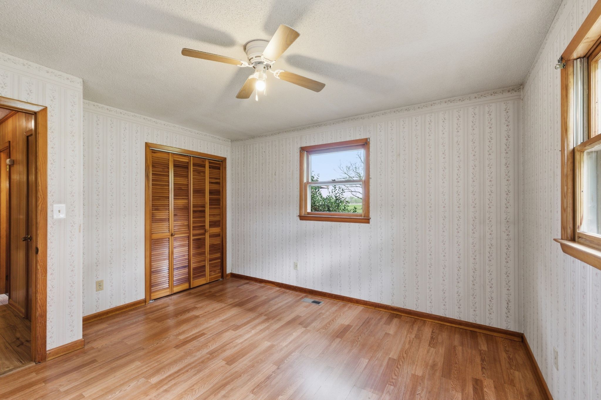 1956 Old Estill Springs Road Winchester, TN 37398 - Photo 16 of 30 wooden floor in an empty room with a window