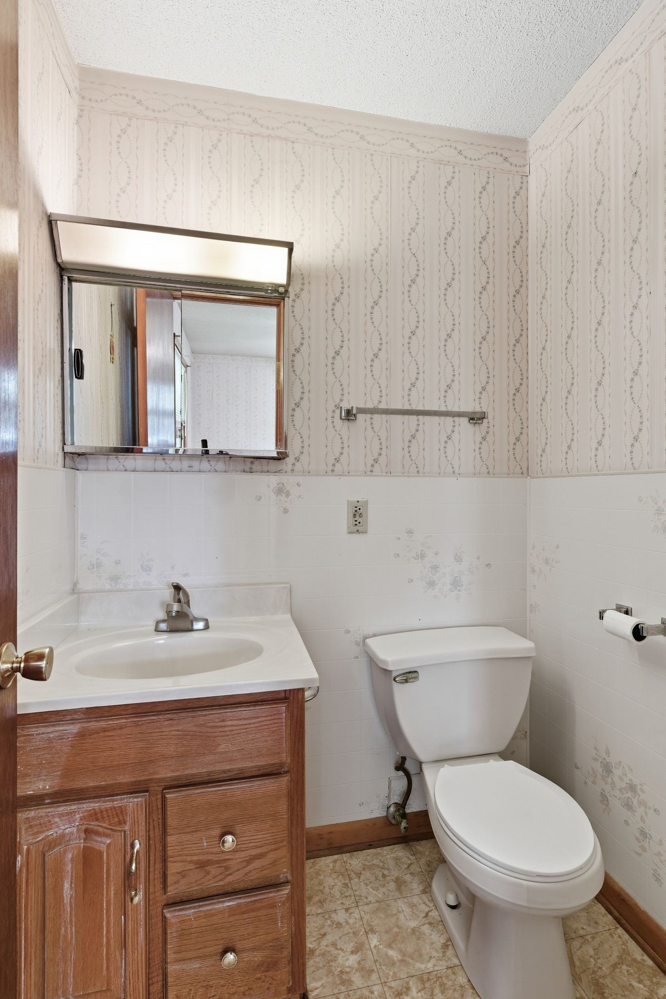 1956 Old Estill Springs Road Winchester, TN 37398 - Photo 18 of 30 a bathroom with a toilet a sink and mirror