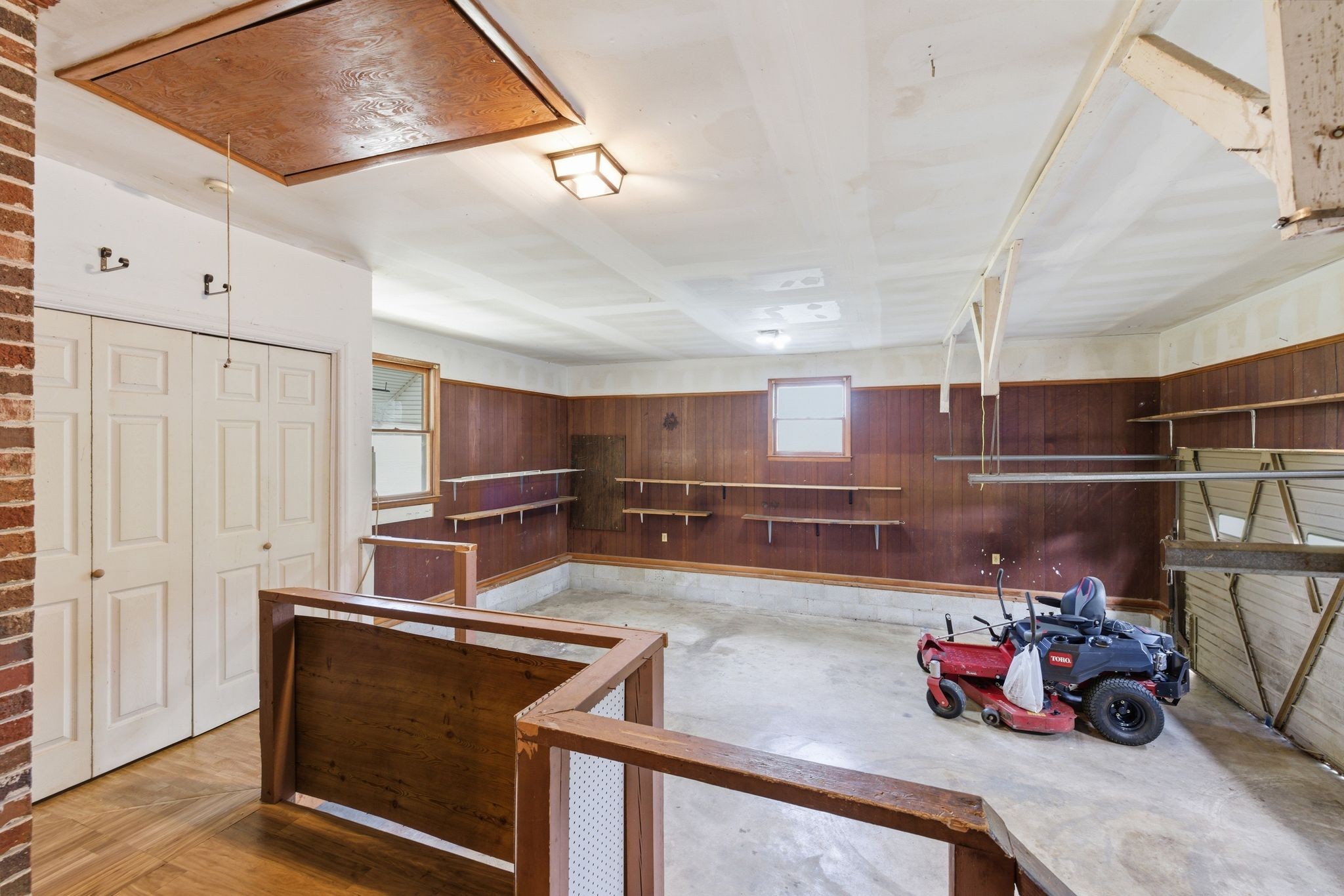 1956 Old Estill Springs Road Winchester, TN 37398 - Photo 19 of 30 a kitchen with kitchen island white cabinets and appliances
