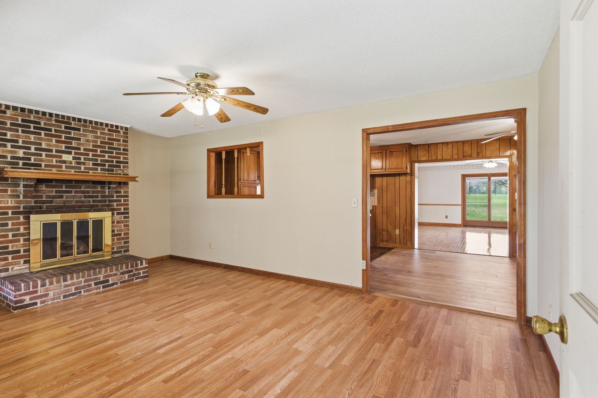 1956 Old Estill Springs Road Winchester, TN 37398 - Photo 6 of 30 wooden floor in an empty room with a window