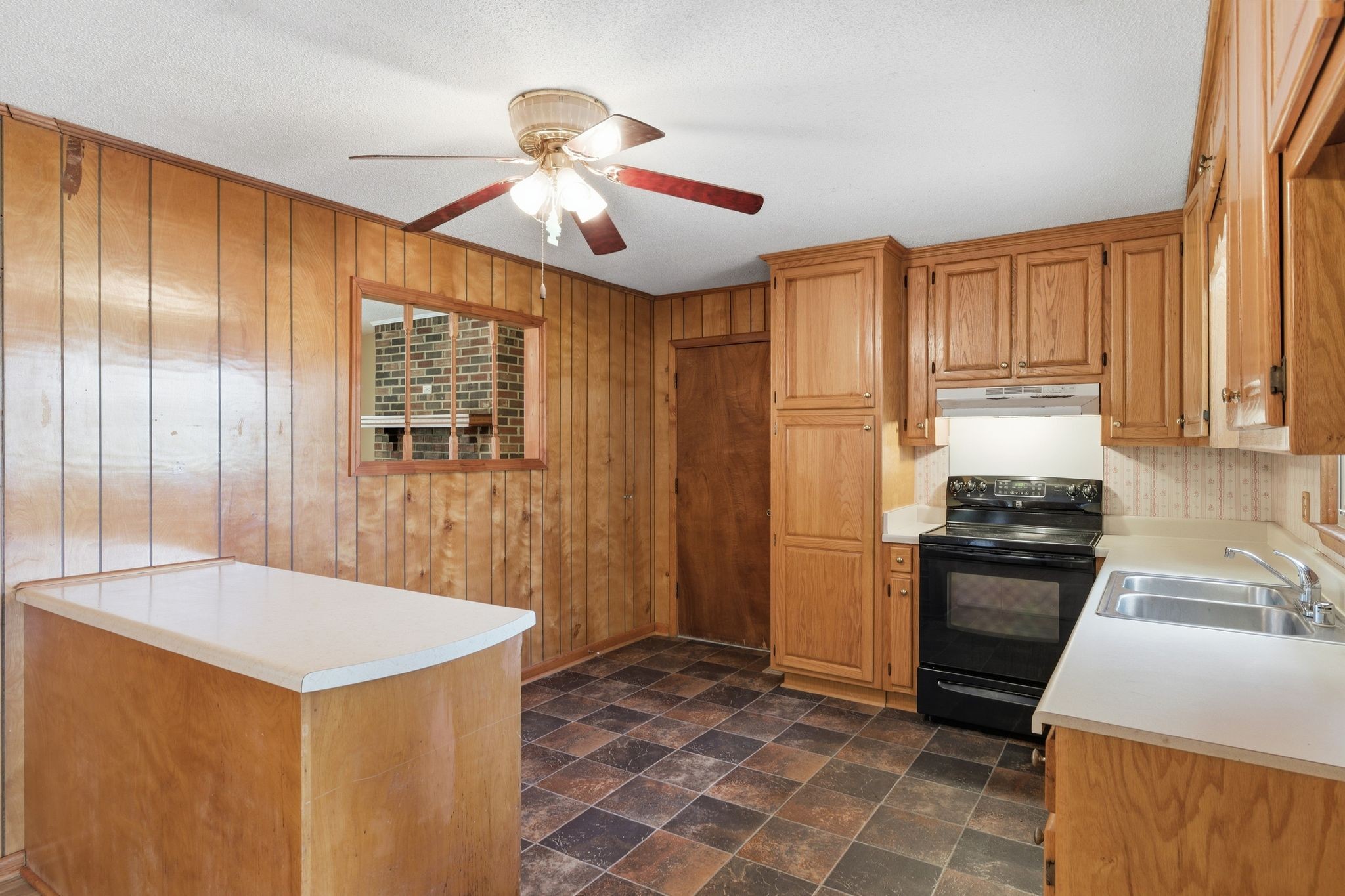 1956 Old Estill Springs Road Winchester, TN 37398 - Photo 9 of 30 a kitchen with stainless steel appliances granite countertop a refrigerator a sink a stove and island