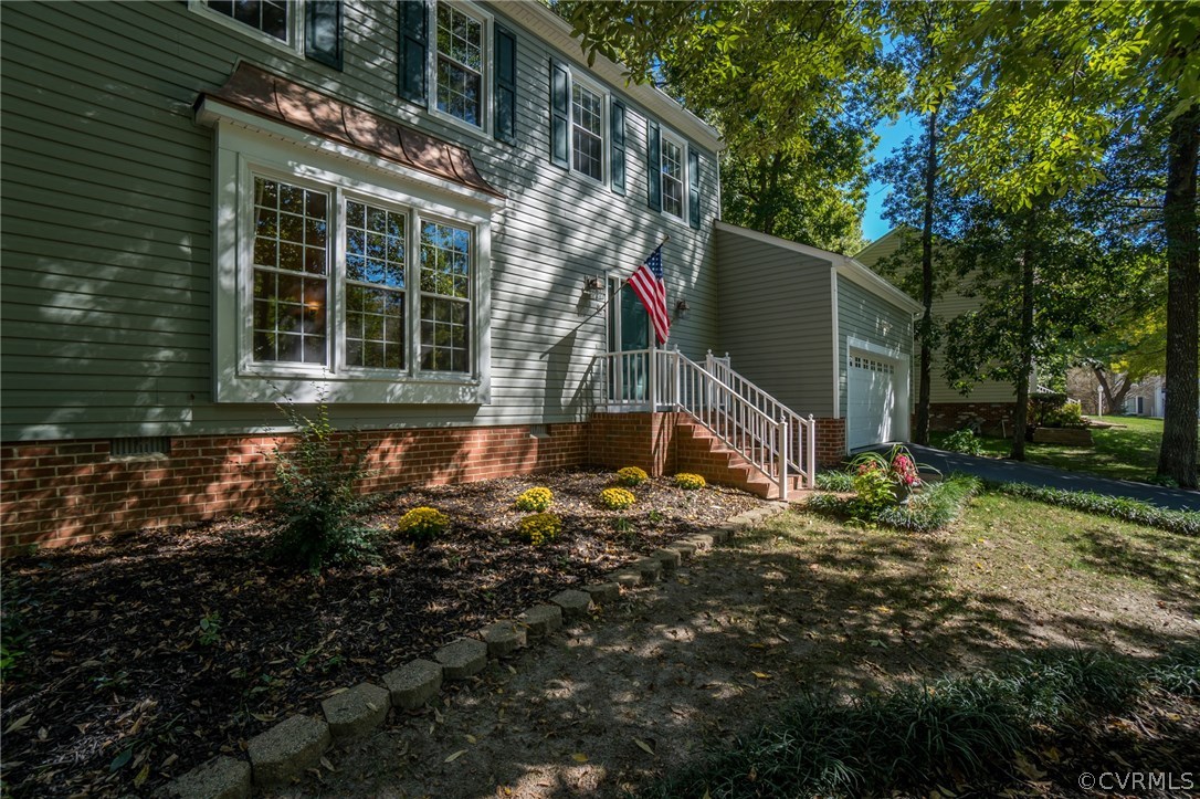 6106 Walnut Landing Way Chester, VA 23831 - Photo 3 of 41 a backyard of a house with barbeque oven