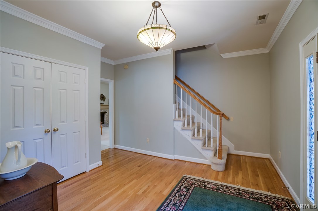 6106 Walnut Landing Way Chester, VA 23831 - Photo 5 of 41 a view of an empty room and wooden floor