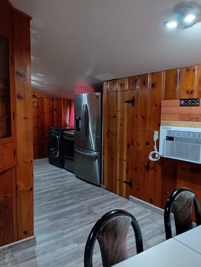 302 South 3rd Street Lamar, CO 81052 - Photo 4 of 12 a bedroom with a bed and a television