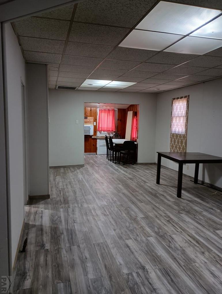 302 South 3rd Street Lamar, CO 81052 - Photo 5 of 12 a view of a livingroom with furniture and a flat screen tv