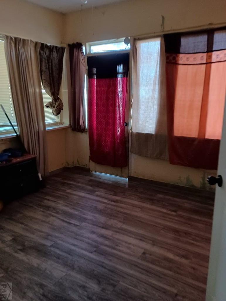 302 South 3rd Street Lamar, CO 81052 - Photo 9 of 12 a view of walk in closet with clothes and shoes