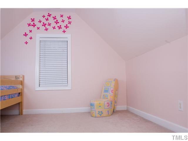 828 Cedar Downs Drive Raleigh, NC 27607 - Photo 13 of 16 a room with toys and wooden floor