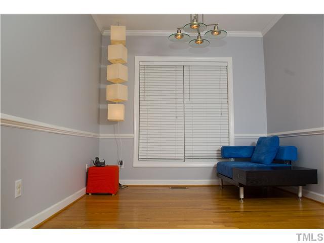 828 Cedar Downs Drive Raleigh, NC 27607 - Photo 6 of 16 a living room with furniture and a window