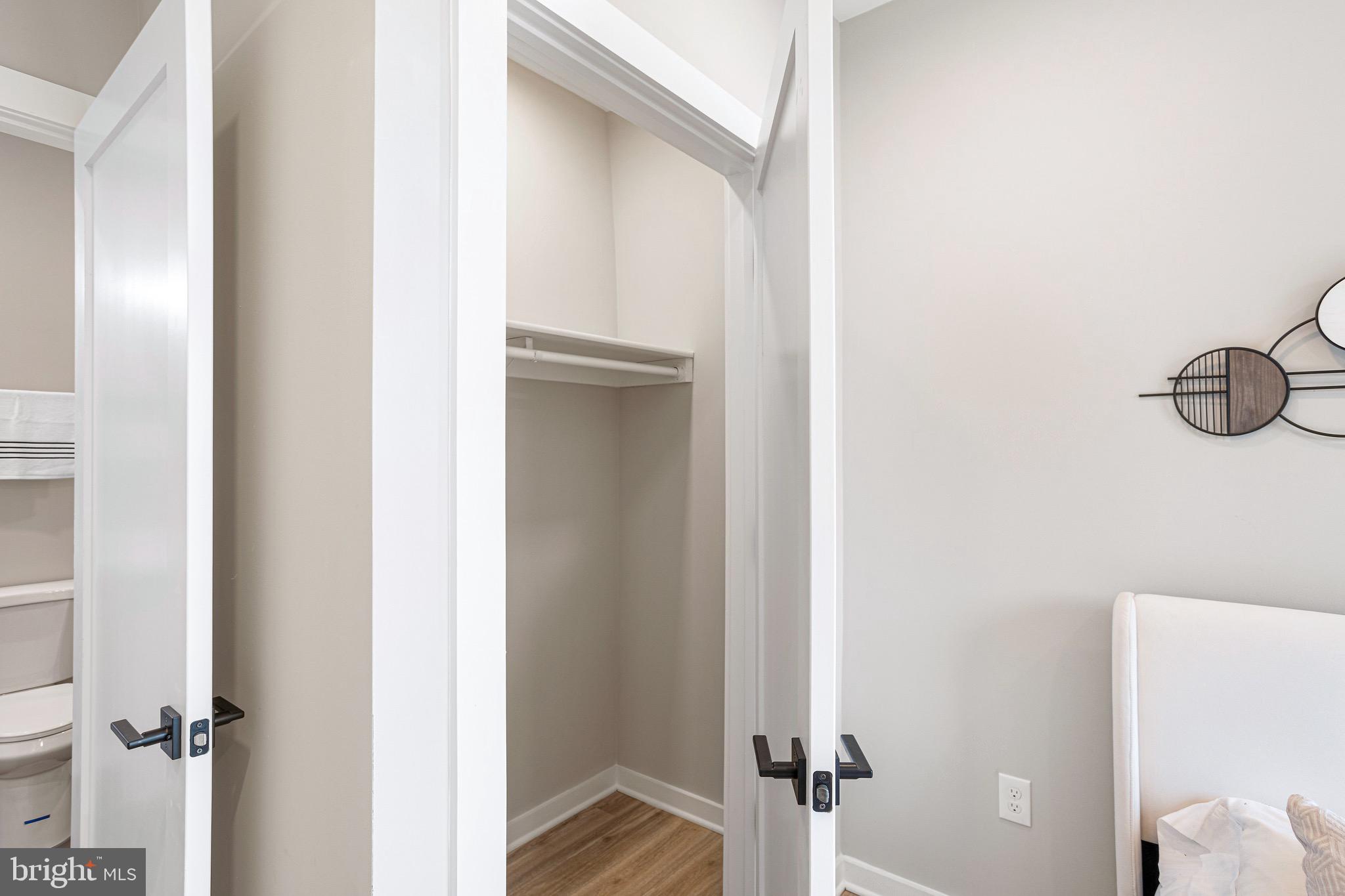 1358 Florida Avenue Northeast, Unit 402 Washington, DC 20002 - Photo 6 of 19 a view of a hallway with wooden floor
