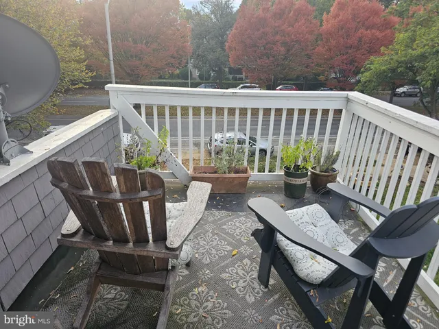 a view of a chairs and table on the terrace
