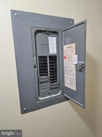 a view of balcony with wooden floor and outdoor seating