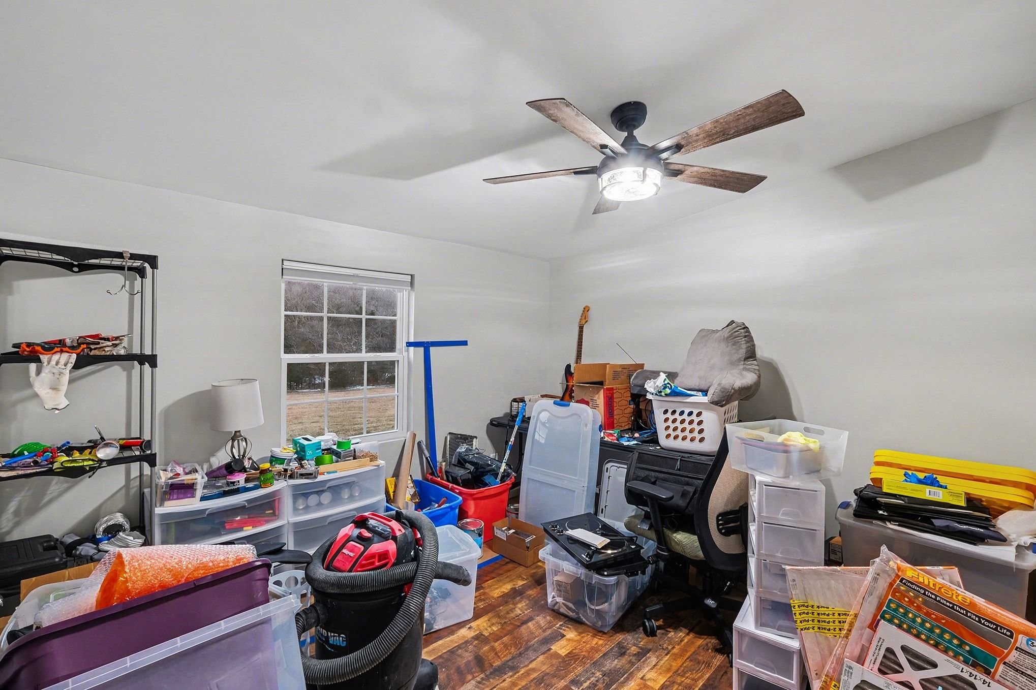 44 Opossum Hollow Road Gordonsville, TN 38563 - Photo 14 of 28 a room with furniture and wooden floor