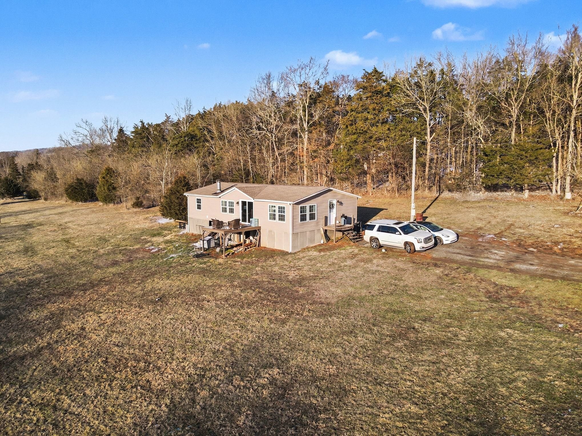 44 Opossum Hollow Road Gordonsville, TN 38563 - Photo 2 of 28 a view of a house with a yard