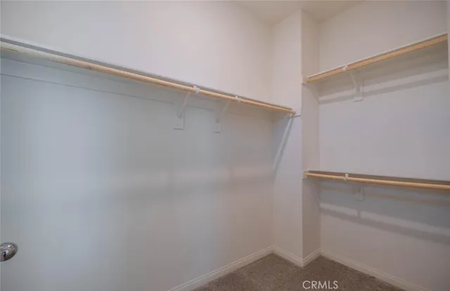 a bathroom with a double vanity sink and mirror