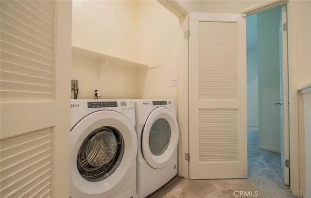 a bathroom with a sink a toilet a shower and a mirror