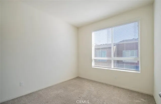 a white toilet sitting next to a bath tub