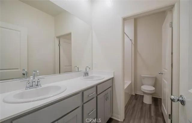 an empty room with closet area