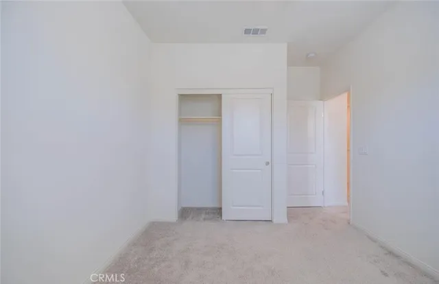 a view of a pathway along the building