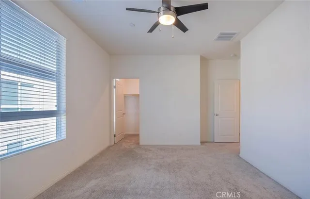 a view of an empty walk in closet