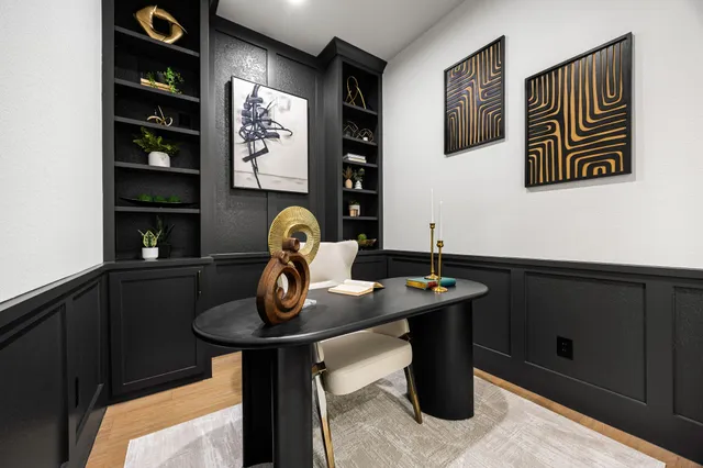a bathroom with a double vanity sink toilet and a mirror