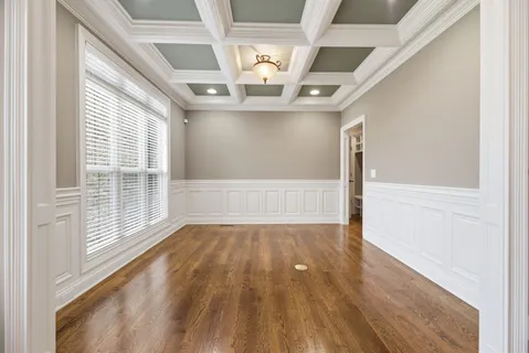a large kitchen with stainless steel appliances granite countertop a stove and a sink