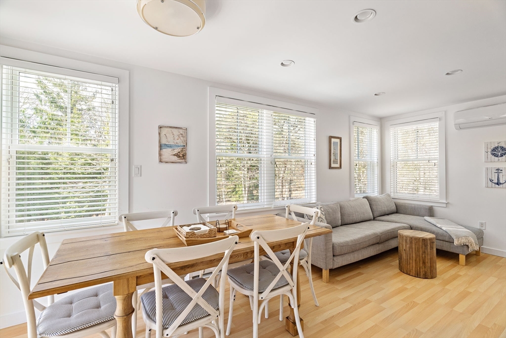 13 Young Street Edgartown, MA 02539 - Photo 5 of 29 a living room with furniture and a large window