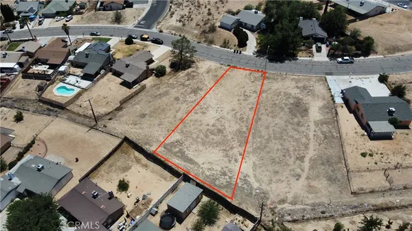 an aerial view of residential house with outdoor space