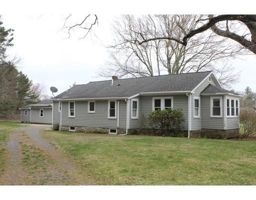 278 New Bedford Road Rochester, MA 02770 - Photo 2 of 23 a front view of house with yard and trees around