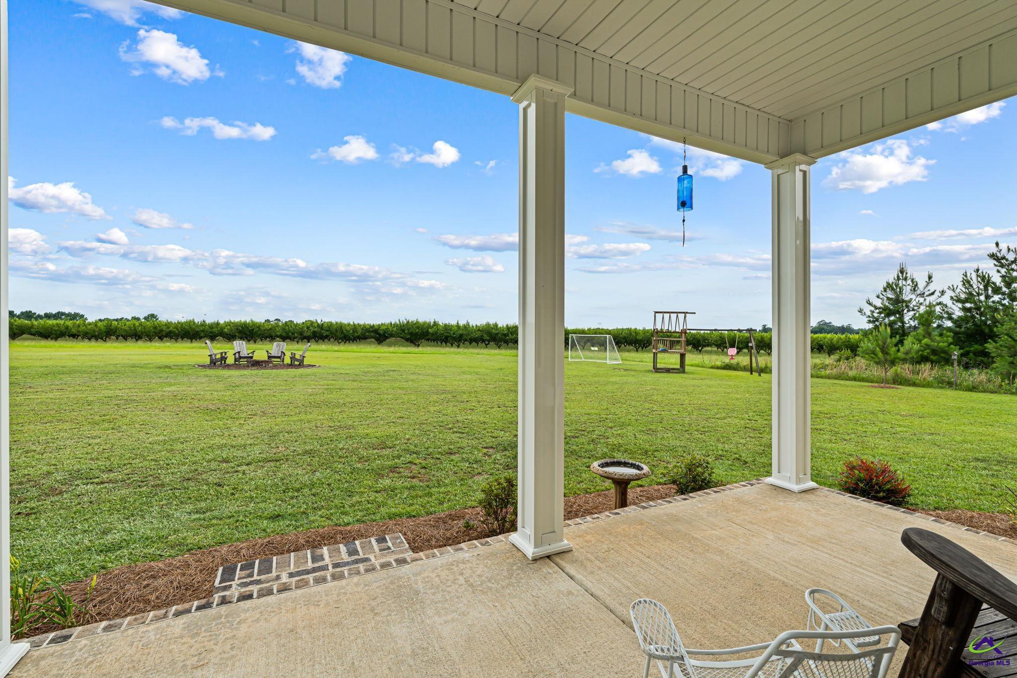 180 Woodland Trail Road Cochran, GA 31014 - Photo 21 of 25 a view of a balcony with an ocean
