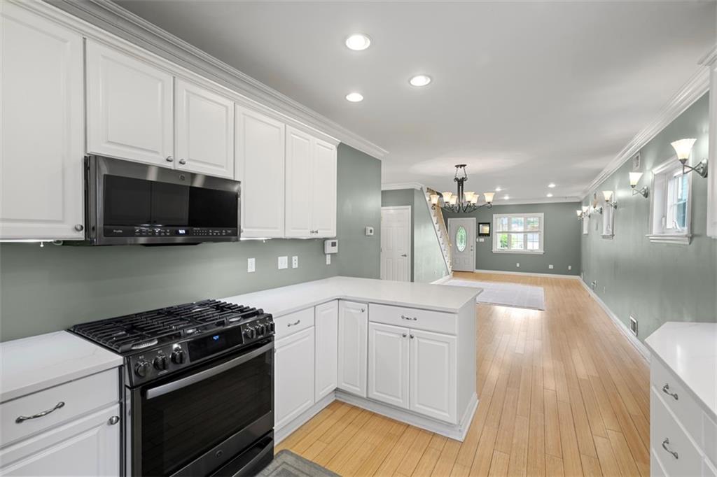 430 Hill Street Carnegie, PA 15106 - Photo 15 of 33 a kitchen with stainless steel appliances granite countertop a stove and a sink
