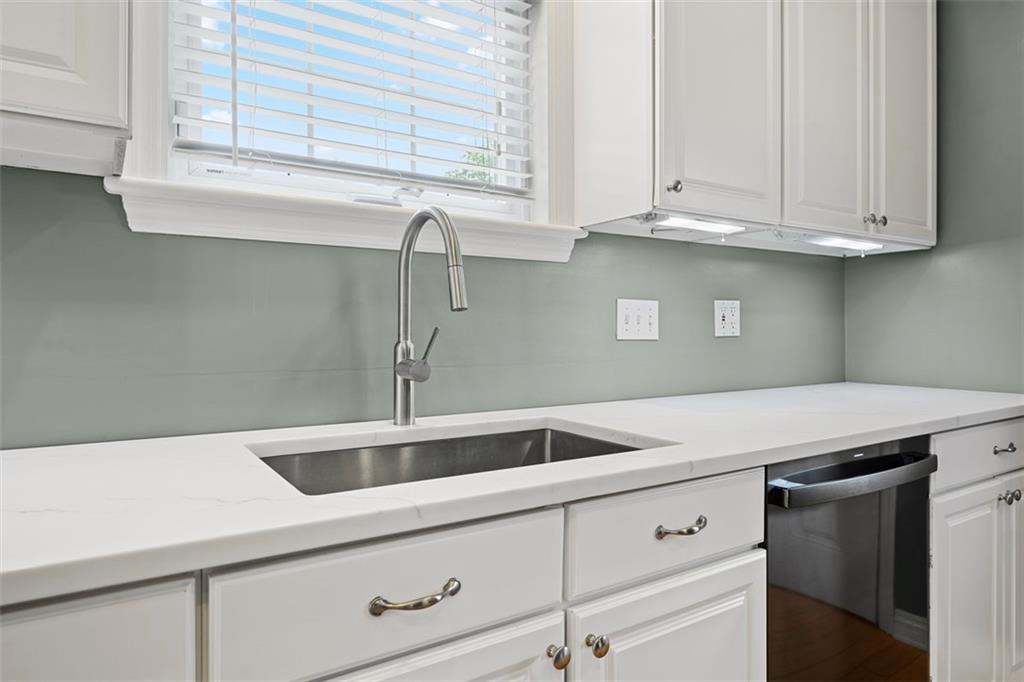 430 Hill Street Carnegie, PA 15106 - Photo 16 of 33 a kitchen with stainless steel appliances white cabinets and a sink