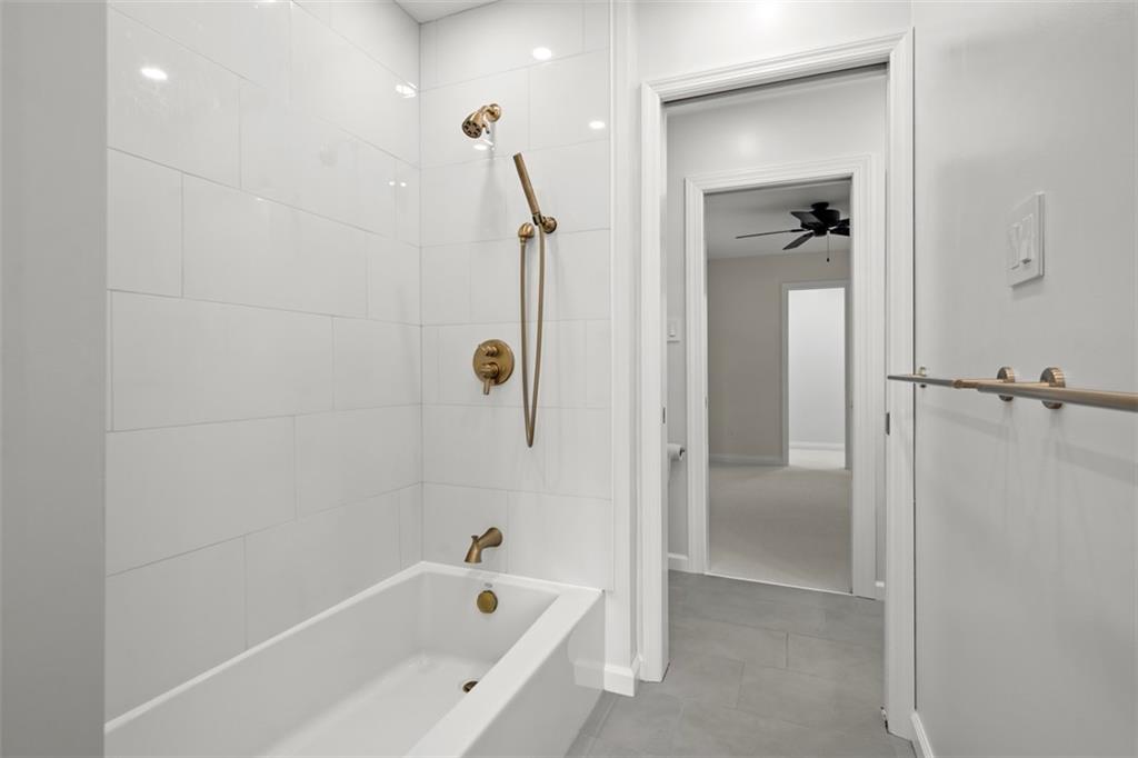 430 Hill Street Carnegie, PA 15106 - Photo 23 of 33 a bathroom with a bathtub and a shower