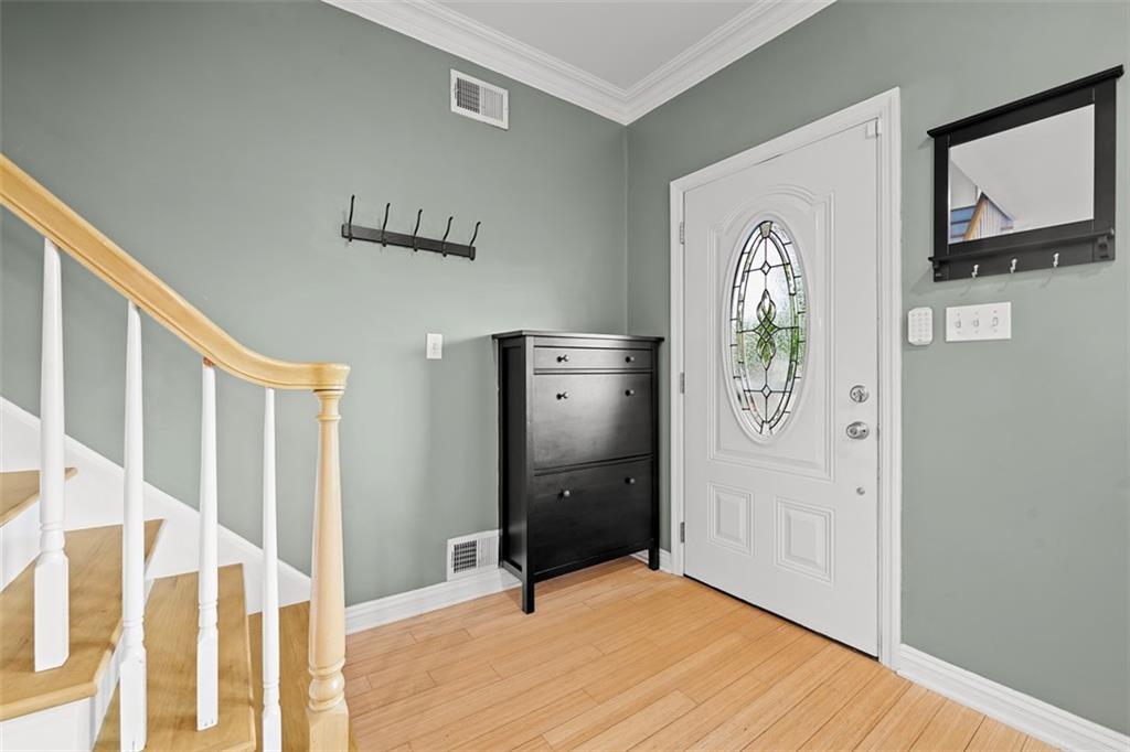 430 Hill Street Carnegie, PA 15106 - Photo 4 of 33 a view of an entryway with wooden floor