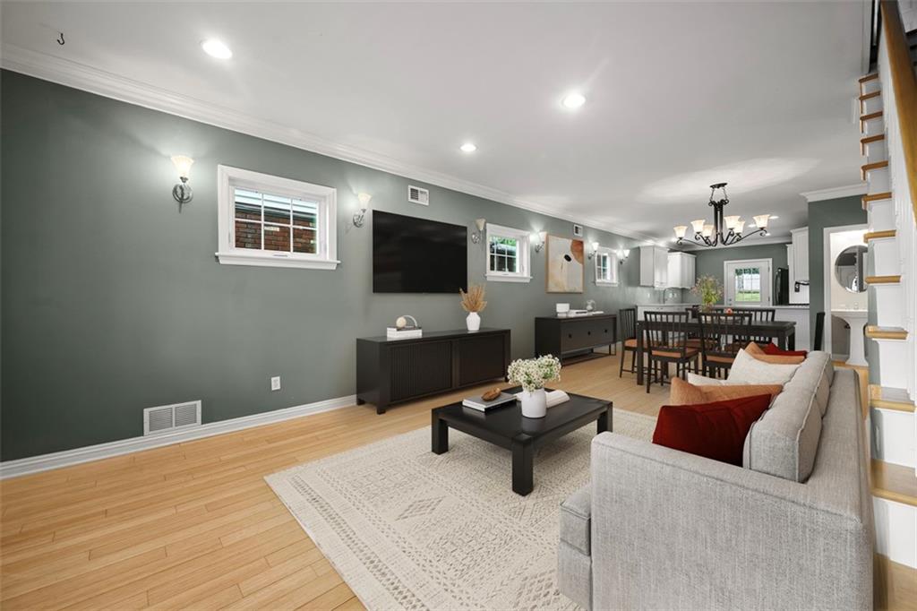430 Hill Street Carnegie, PA 15106 - Photo 6 of 33 a living room with furniture and a flat screen tv