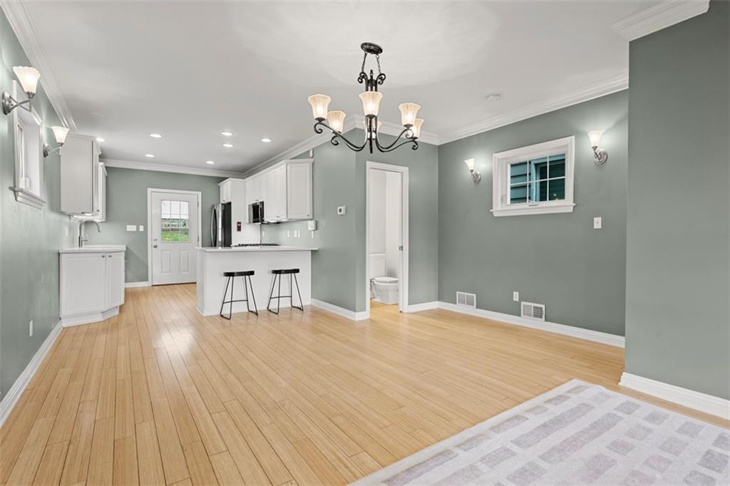 430 Hill Street Carnegie, PA 15106 - Photo 10 of 33 a view of kitchen with granite countertop cabinets and refrigerator