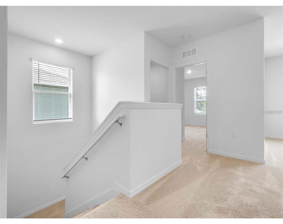 3993 Rory Oak Circle Apopka, FL 32703 - Photo 9 of 19 a view of a room that has a window