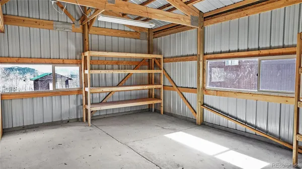a view of an empty room with a garage
