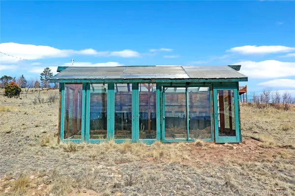 a view of a house with a roof deck