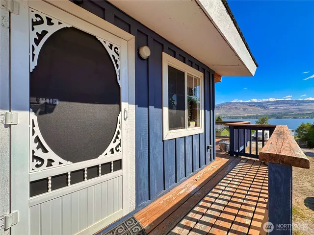 a view of balcony with wooden floor