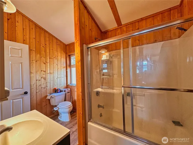 a bathroom with a sink and shower