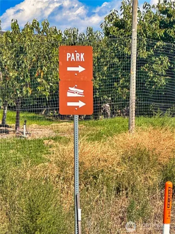 a view of swimming pool with outdoor seating