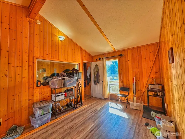 a view of a room with racks on the wall