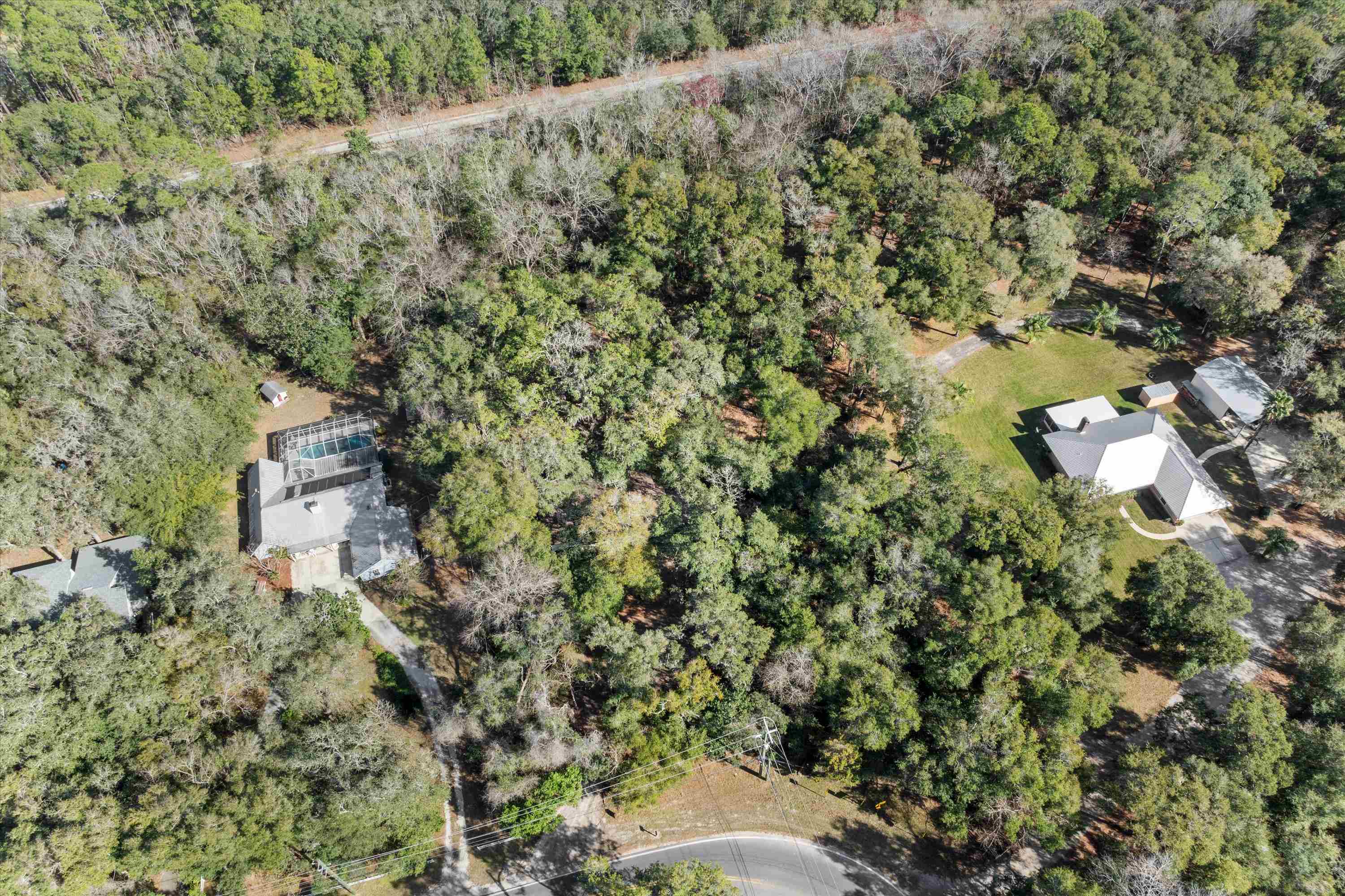2884 Kings Road St. Augustine, FL 32086 - Photo 27 of 27 a aerial view of a house with a yard