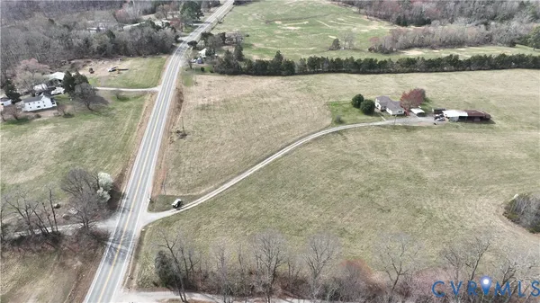 a view of yard with swimming pool