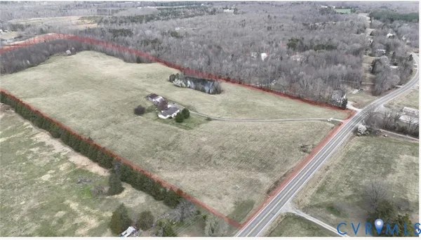 a view of a house with a big yard