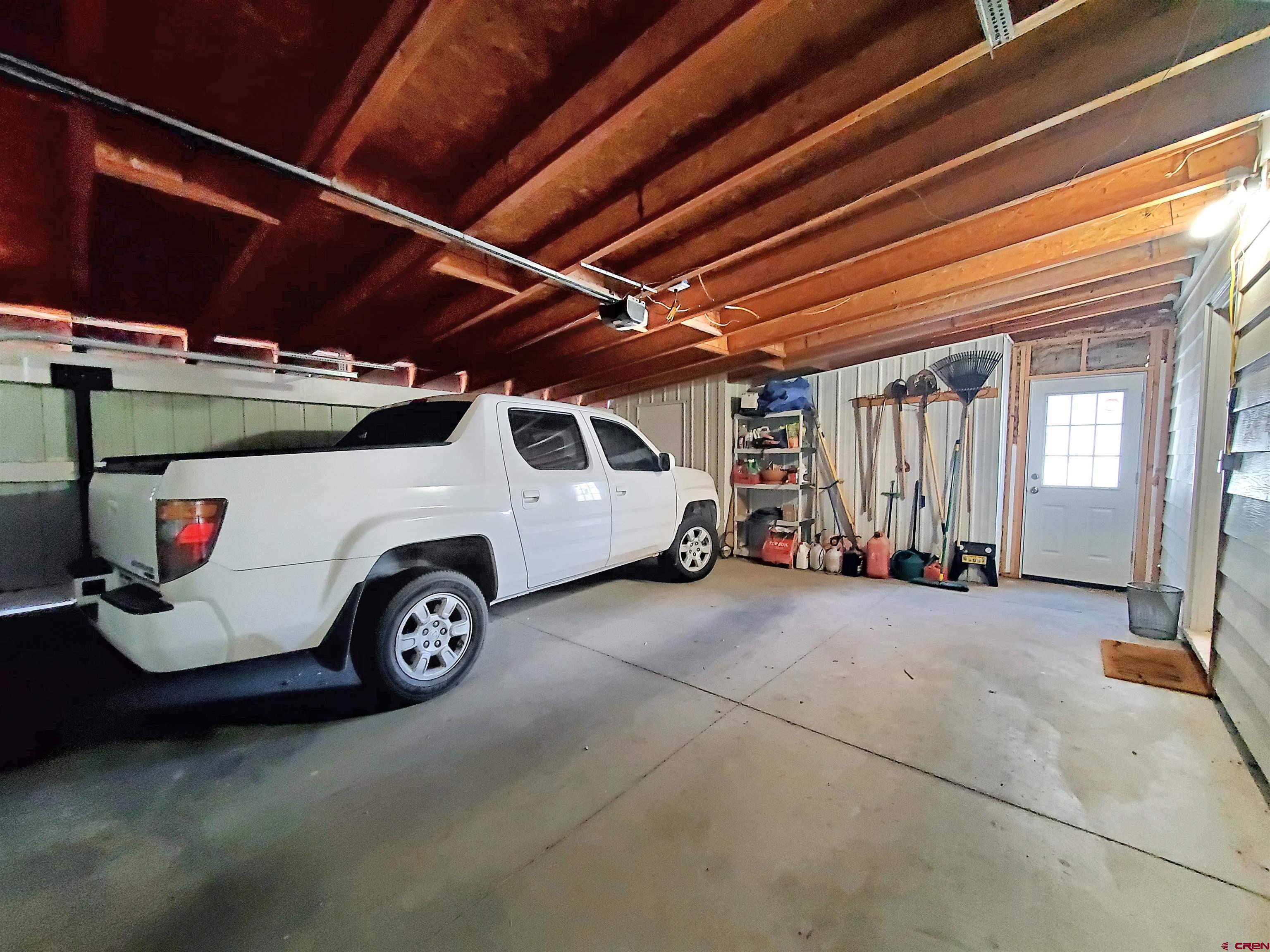 1918 Rolling Road Cortez, CO 81321 - Photo 21 of 26 a view of a car parking garage